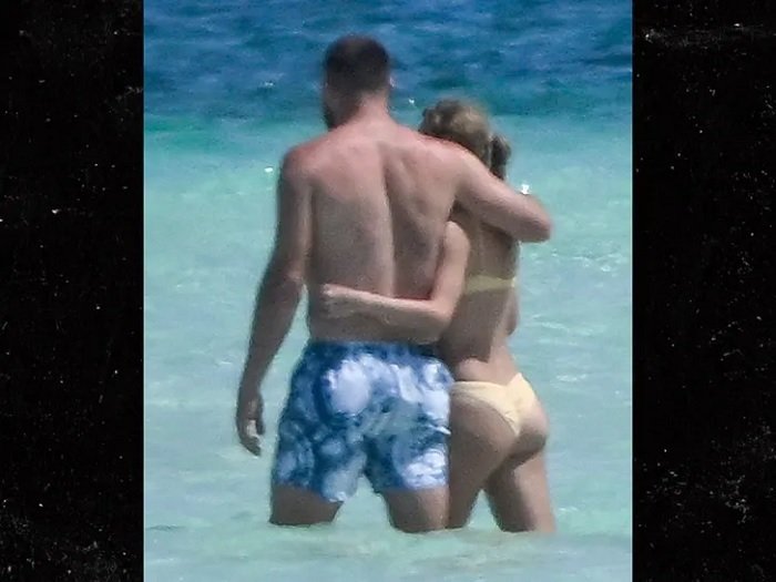 Taylor Swift and Travis Kelce share steamy beach kiss during PDA-filled Bahamas getaway