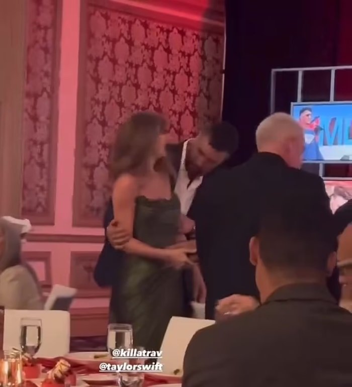 New footage shows Travis Kelce kissing Taylor Swift's shoulder