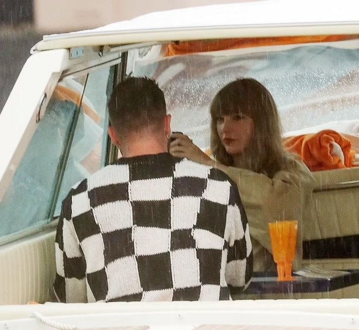 Taylor Swift and Travis Kelce are pictured kissing and embracing on boat ride in scenic Lake Como during romantic break